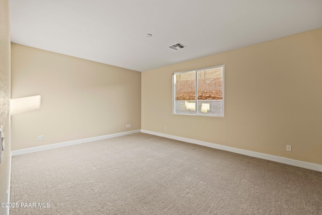 unfurnished room featuring carpet floors