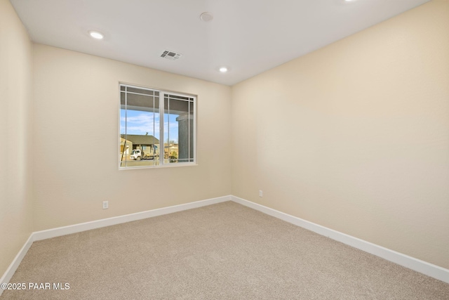 unfurnished room with carpet