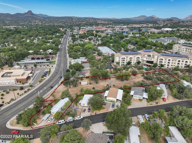 drone / aerial view featuring a mountain view