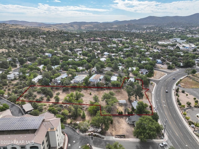 drone / aerial view featuring a mountain view