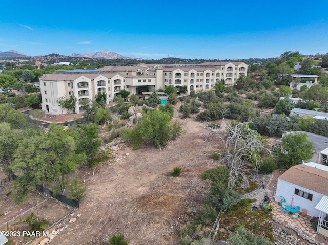 drone / aerial view featuring a mountain view