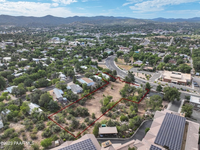 birds eye view of property featuring a mountain view