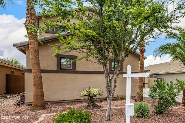 8214 S 48th Dr, Laveen, AZ 85339 - view of side of home featuring stucco siding