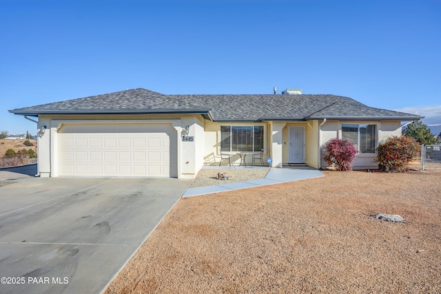 single story home with a garage