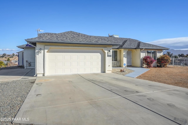 single story home with a garage