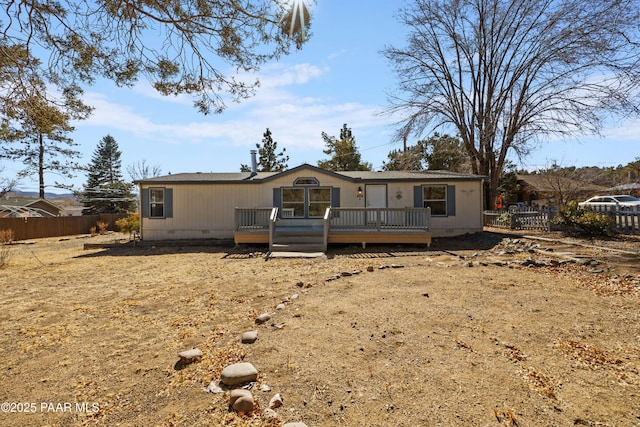 view of front of home with a deck