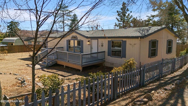 exterior space with a wooden deck