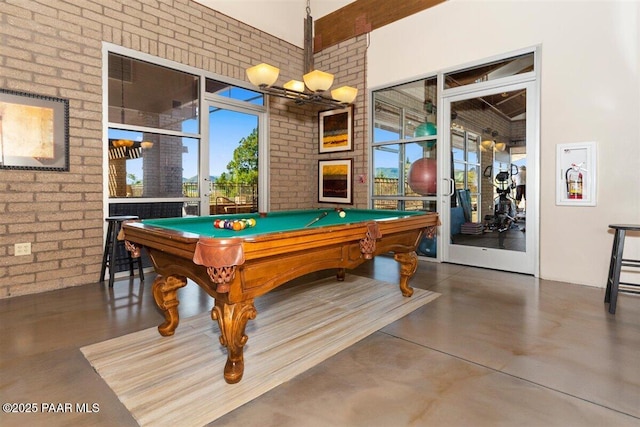 13014 E Vega St, Dewey-Humboldt, AZ 86327 - recreation room with concrete flooring, brick wall, and pool table