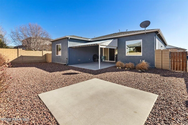 13014 E Vega St, Dewey-Humboldt, AZ 86327 - rear view of house featuring a patio, a fenced backyard, and stucco siding