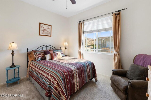 13014 E Vega St, Dewey-Humboldt, AZ 86327 - carpeted bedroom featuring baseboards and a ceiling fan