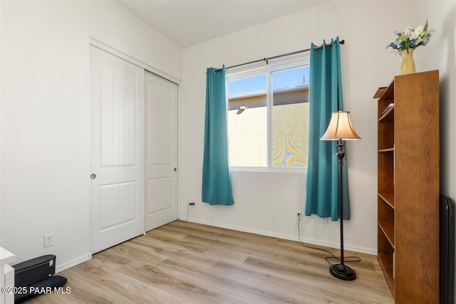 13014 E Vega St, Dewey-Humboldt, AZ 86327 - unfurnished bedroom featuring wood finished floors and a closet