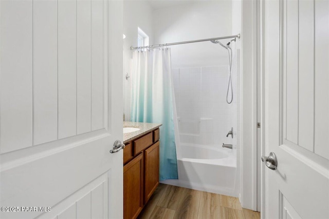 13014 E Vega St, Dewey-Humboldt, AZ 86327 - bathroom featuring shower / bath combo with shower curtain, wood finished floors, and vanity