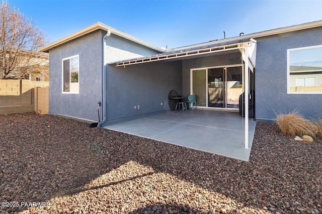 13014 E Vega St, Dewey-Humboldt, AZ 86327 - rear view of house featuring stucco siding and a patio
