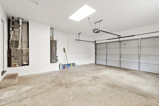 garage featuring water heater and a garage door opener