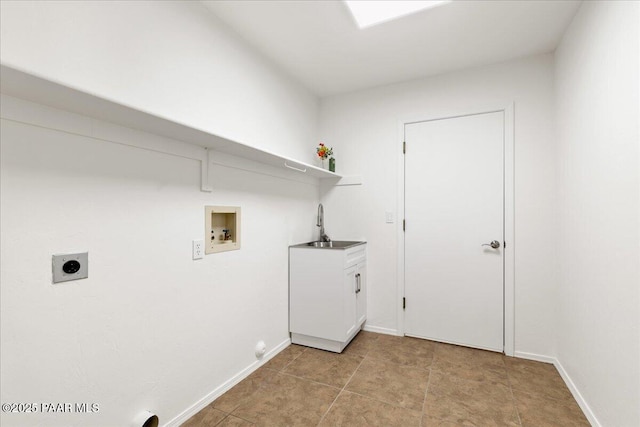 washroom featuring hookup for a washing machine, baseboards, hookup for an electric dryer, and a sink