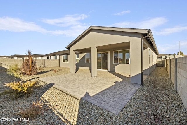 rear view of house with a patio area