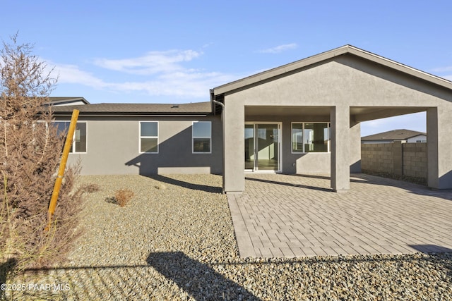 rear view of property with a patio