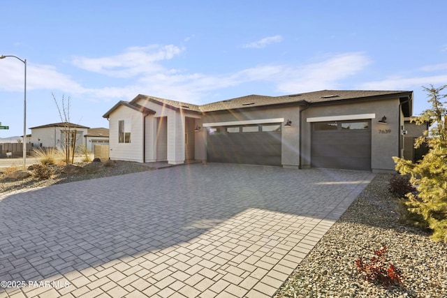 view of front of property featuring a garage