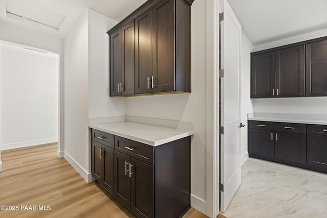 bar with dark brown cabinets