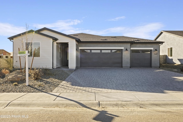 view of front of home with a garage