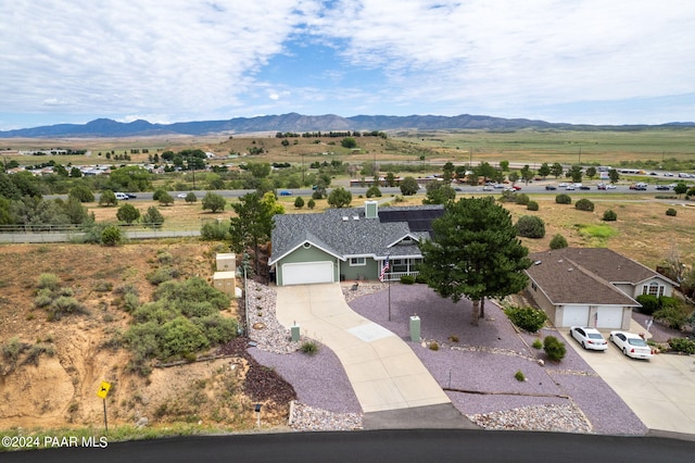 birds eye view of property featuring a rural view and a mountain view