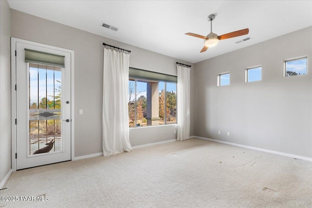 5560 W Halcyone Cir, Prescott, AZ 86305 - carpeted empty room with a wealth of natural light, visible vents, and baseboards