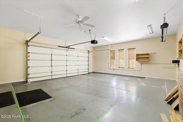 5560 W Halcyone Cir, Prescott, AZ 86305 - garage featuring a garage door opener and baseboards