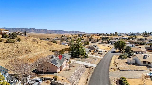 birds eye view of property with a residential view and a mountain view