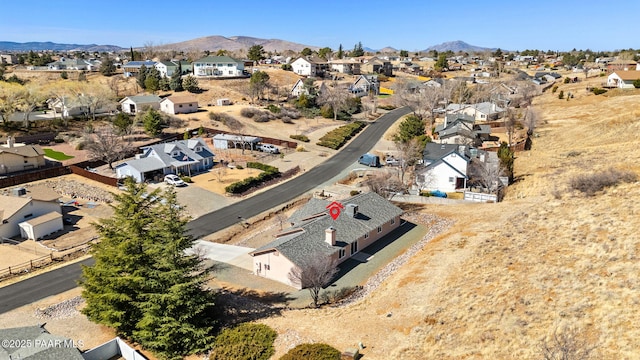 bird's eye view with a residential view and a mountain view