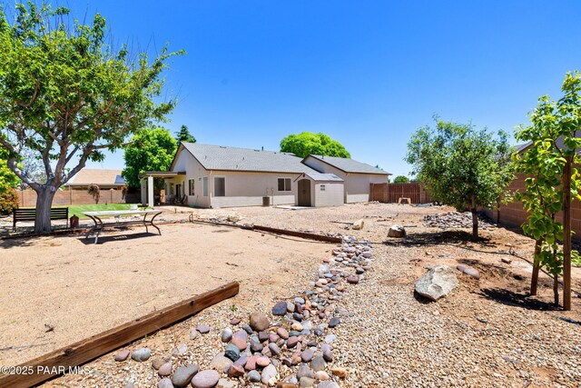 7812 E Rusty Spur Trl, Prescott Valley, AZ 86315 - rear view of property featuring a fenced backyard