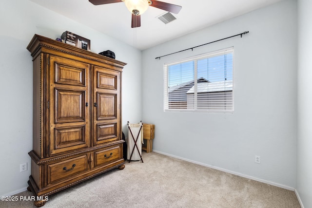 7812 E Rusty Spur Trl, Prescott Valley, AZ 86315 - bedroom featuring light colored carpet, baseboards, and a ceiling fan