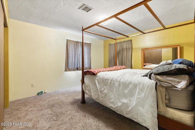 carpeted bedroom with visible vents