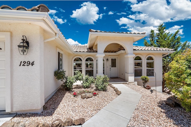 1294 Annolen Pl, Prescott, AZ 86301 - view of exterior entry featuring a tile roof and stucco siding