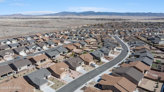 aerial view featuring a mountain view and a residential view