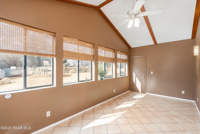 tiled spare room with beamed ceiling, high vaulted ceiling, and ceiling fan