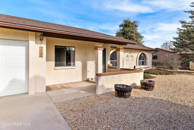 single story home with a garage