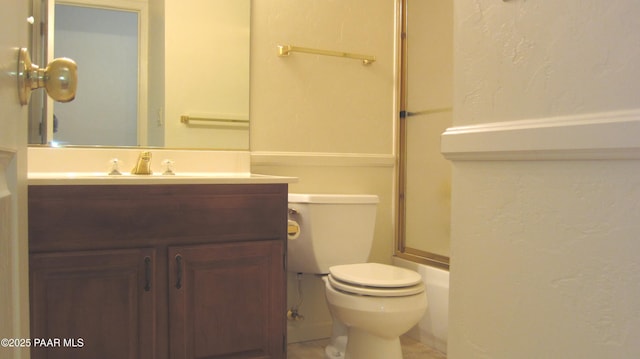 full bathroom featuring vanity and toilet