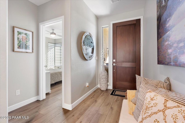 foyer entrance featuring light hardwood / wood-style floors