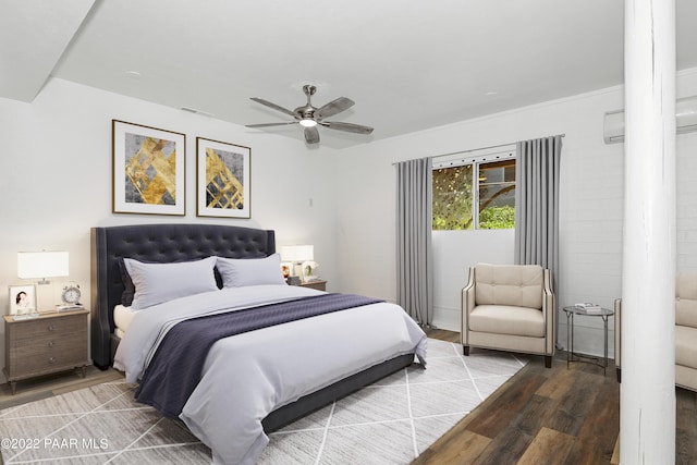 bedroom with hardwood / wood-style floors and ceiling fan