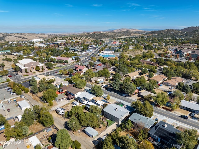 birds eye view of property with a mountain view