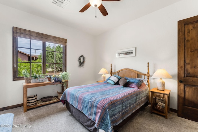 bedroom with ceiling fan and carpet