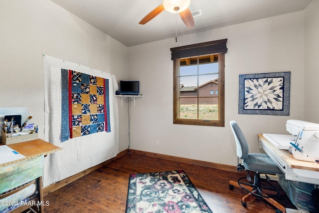 office space featuring dark hardwood / wood-style floors and ceiling fan