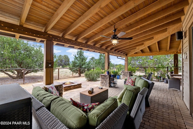 view of patio / terrace with an outdoor living space and ceiling fan