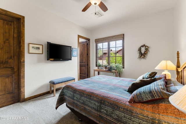 bedroom featuring ceiling fan and light colored carpet