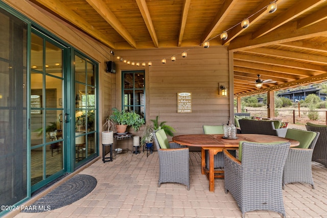 view of patio with ceiling fan