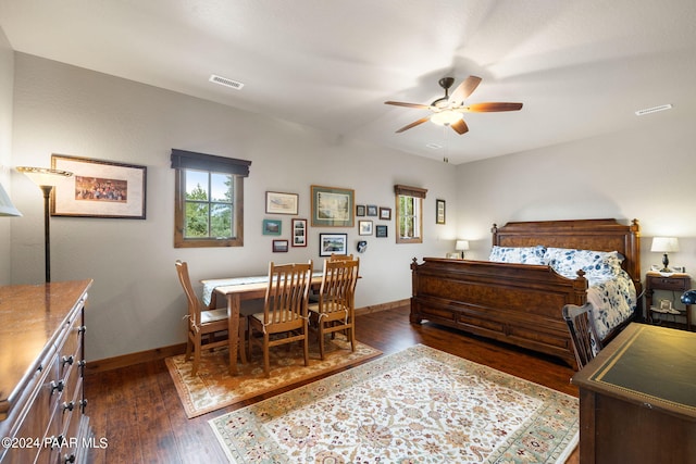 bedroom featuring dark hardwood / wood-style flooring and ceiling fan