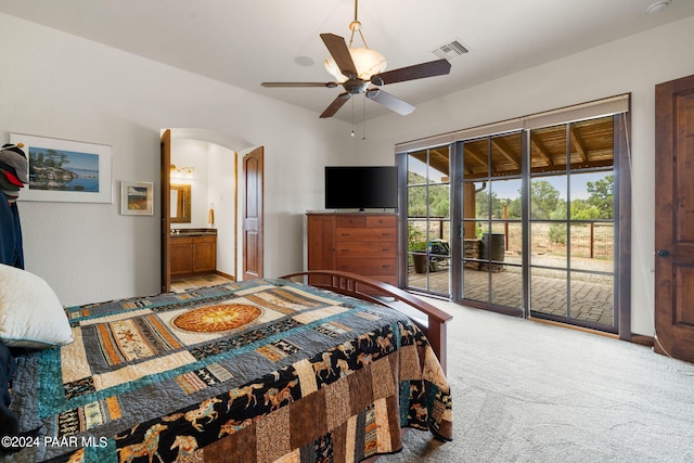 carpeted bedroom with ceiling fan, access to outside, and connected bathroom