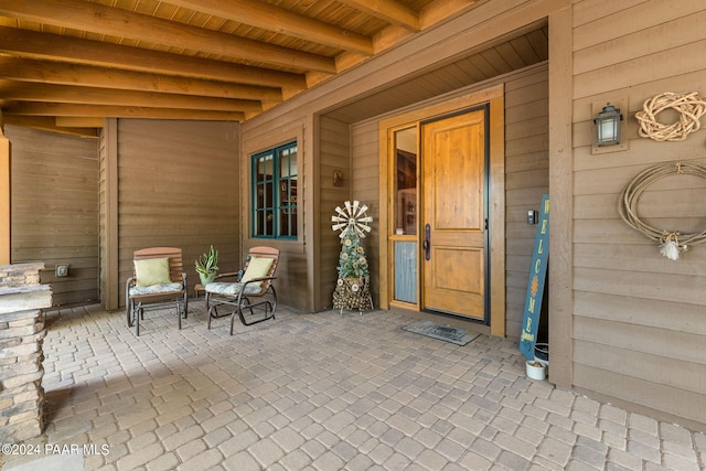 doorway to property with a porch