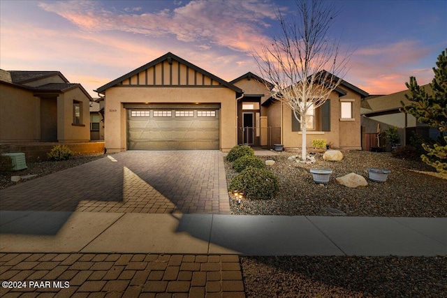 view of front of property featuring a garage