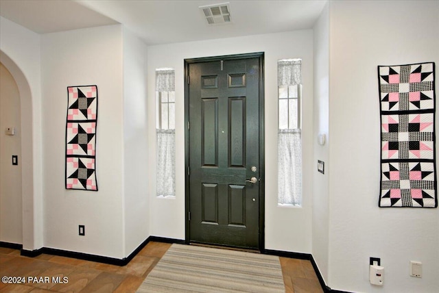 entrance foyer featuring a healthy amount of sunlight